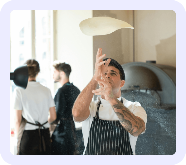 Chef spinning pizza