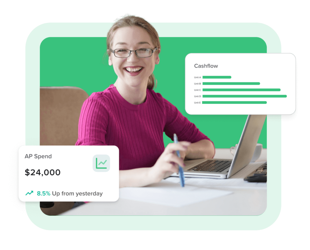 Woman smiling with cashflow reports