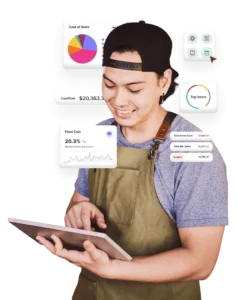 Restaurant employee looking at iPad with data floating around him